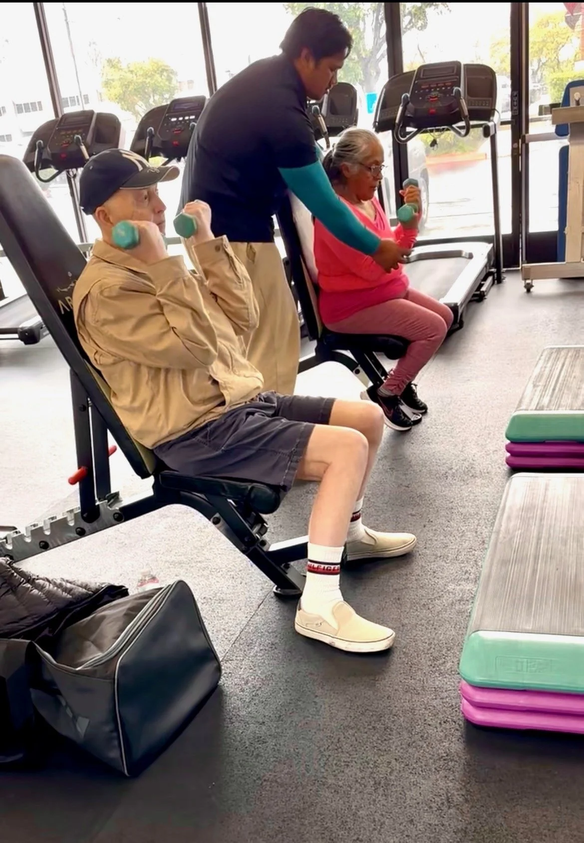 Residents staying active with assisted exercise at A Mother Theresa Care